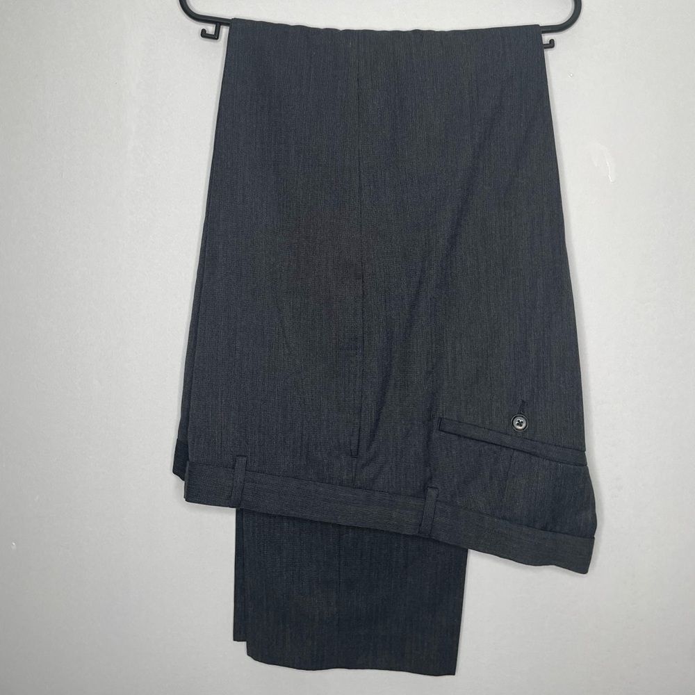 Black Calvin Klein pants.